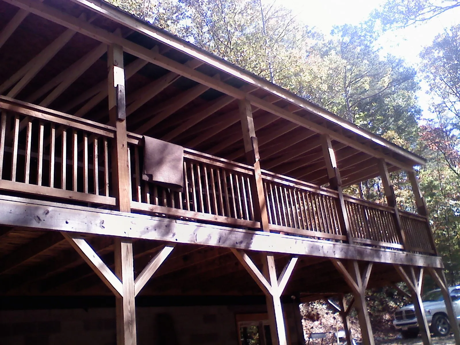 Timber framing under a new elevated porch and deck — Roof Leak Repair in Orrick by Roofing Brothers